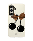 Sweet Sixteen Tough Phone Case  with two black cherries and brown bow on silky beige background full covering the device from our collection Mini Cocktail