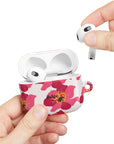 Spring Break AirPods Case featuring big pink flowers on glossy beige background from Spring Edition Collection
