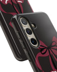 What About Cherries Tough Phone Case | Durable & Stylish, tough phone case featuring two red cherries and bows on black glossy background
