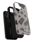 Sweet Course Tough Phone Case featuring design of chocolates in black color on taupe color background fully wrapping around the phone in an artistic way.