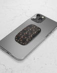 Mysterious Garden Phone Grip featuring dark floral designs giving secure and stylish grip .