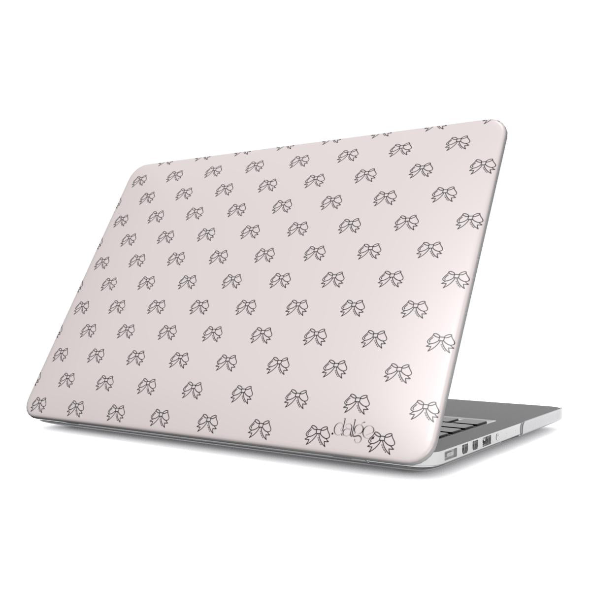 Pretty Bows Laptop Case featuring black graphic bows on mate pink background from the collection Trendy Bows.