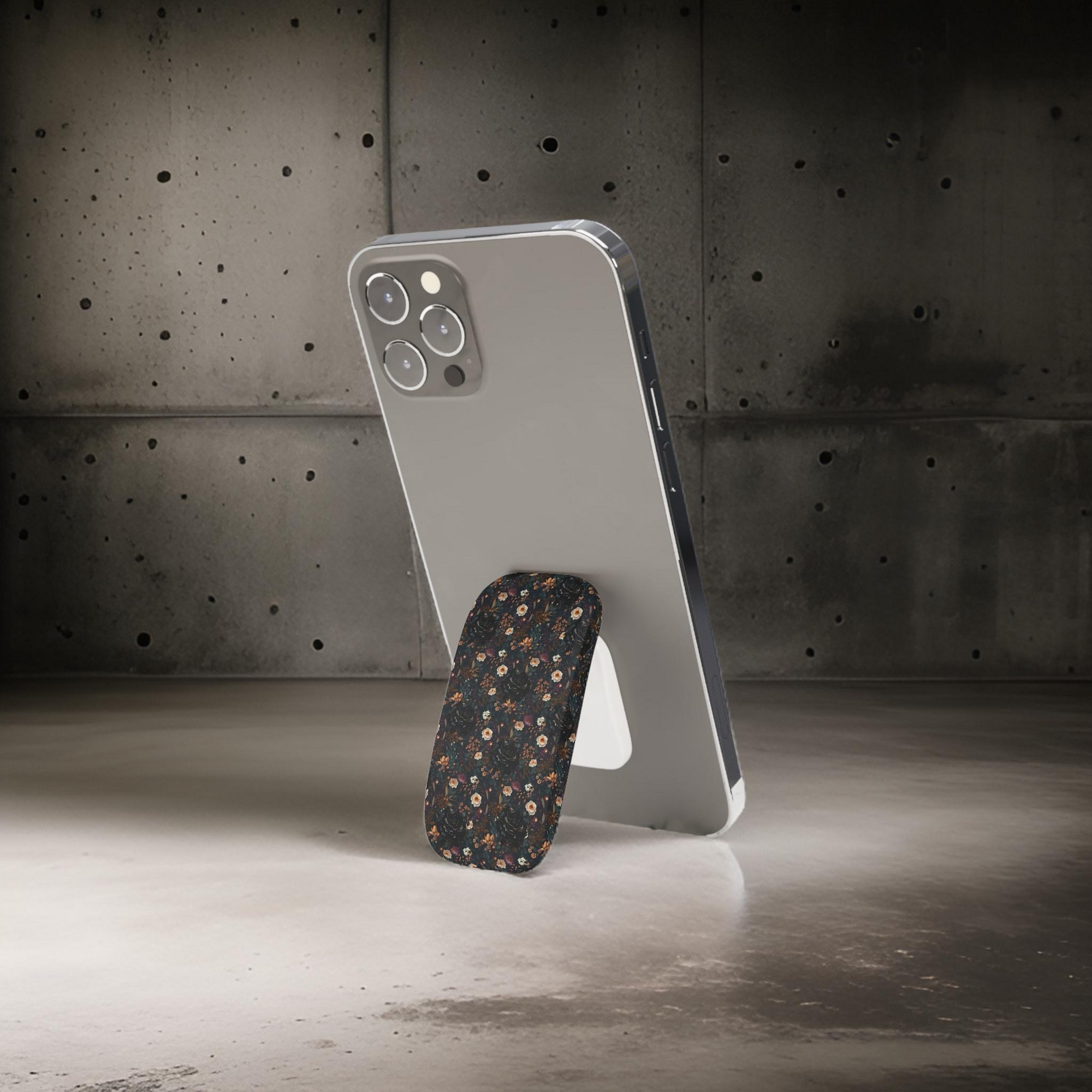 Mysterious Garden Phone Grip featuring dark floral designs giving secure and stylish grip .