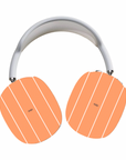 Mood Swings Max Cases featuring orange background with white stripes giving artistic coverage to your AirPods Max.