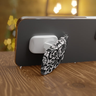 Muse Phone Grip featuring black floral designs on white background in glossy or matte finish